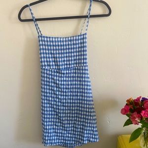 Checkered dress with adjustable, cross-cross back straps. From Ibiza, Spain!